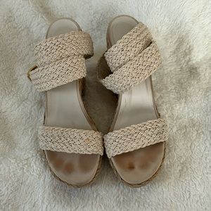 Cream colored Stewart Weitzman wedges.